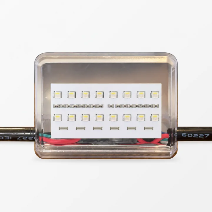 Rear view of a clear Stridelane pacing-light module showing the opposite-facing LED panel